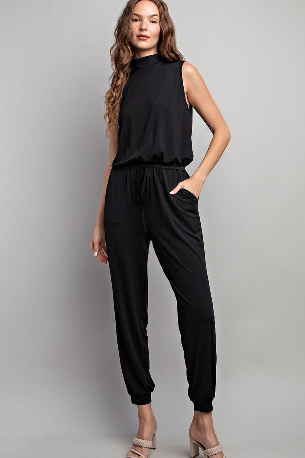 SLEEVELESS MOCK NECK JUMPSUIT